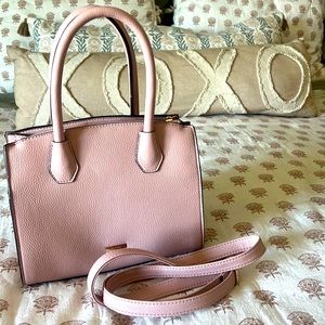 Like new. Used once. Light pink handbag. Can also be shoulder length.